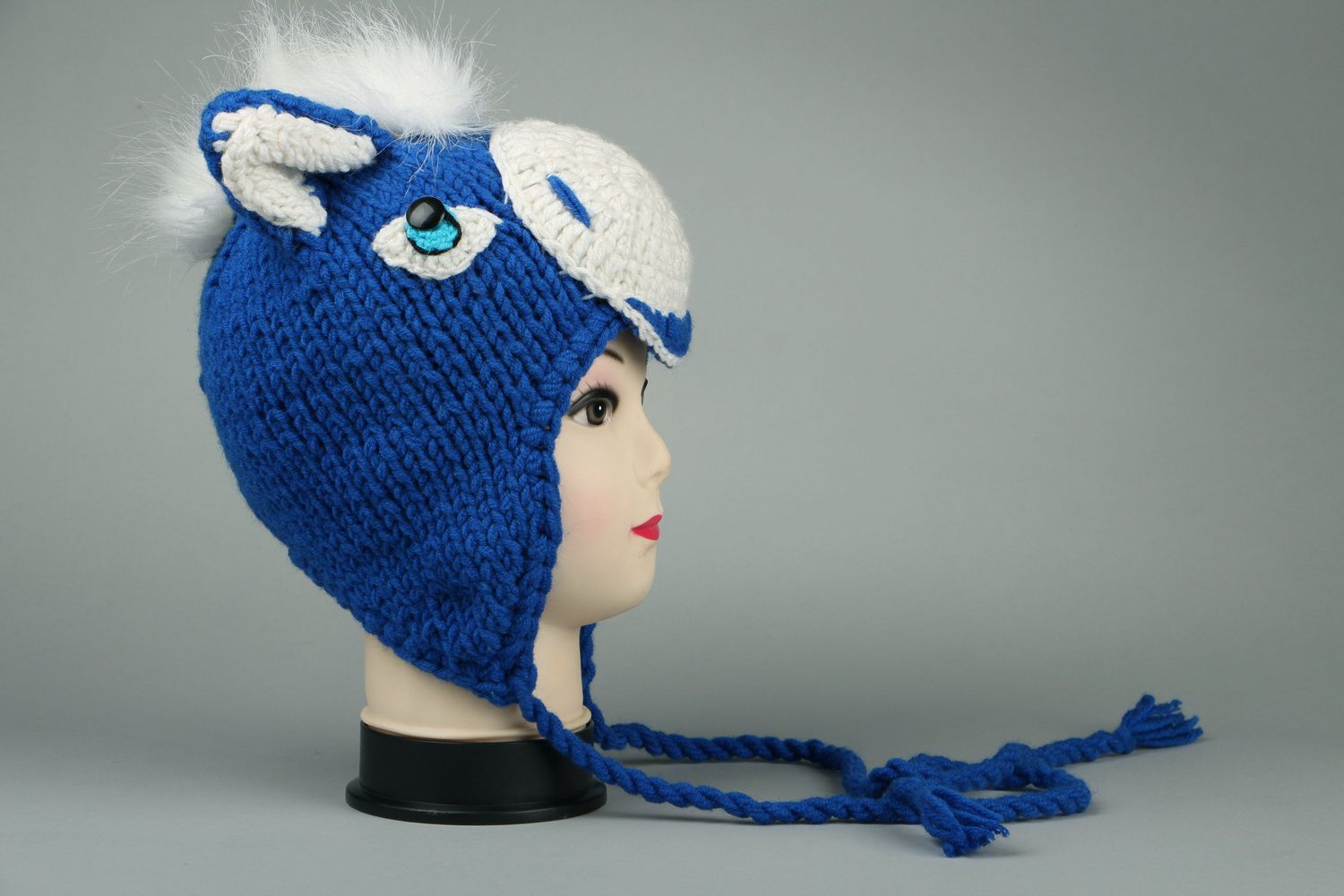 Blaue gestrickte Mütze aus Halbwolle und Kunstpelz Mütze mit Ohren foto 1