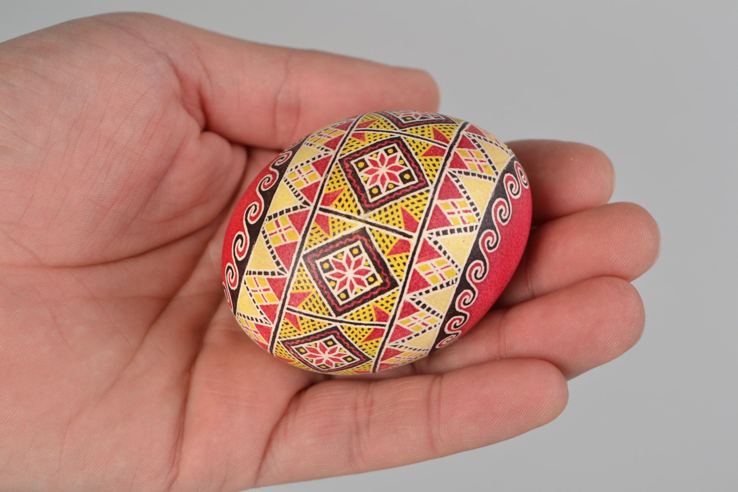 Bright painted handmade Easter egg with ornaments for gift photo 2