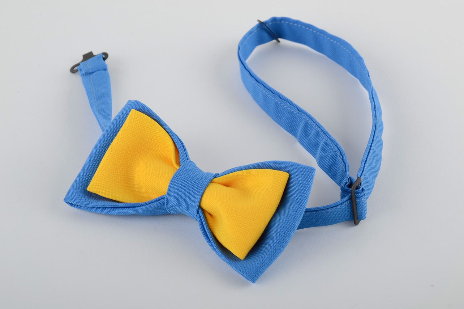 Handmade bow tie sewn of costume fabric in contrast combination of blue and yellow photo 2