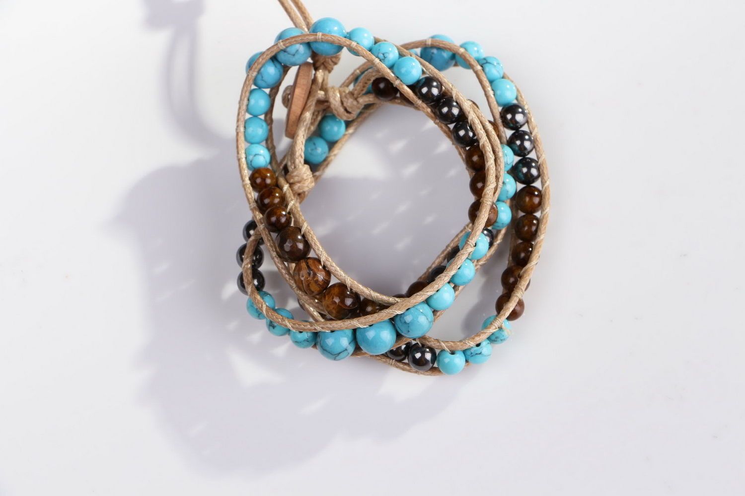 Bracelet made of tiger's eye stone, hematite and turquoise photo 4