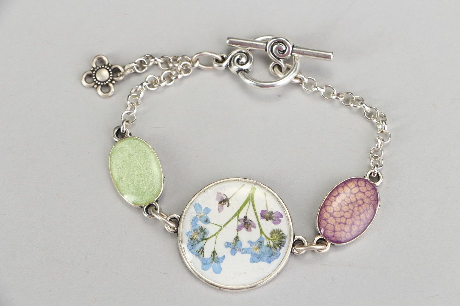Wrist bracelet made of natural flowers coated with epoxy Forget-me-nots photo 1