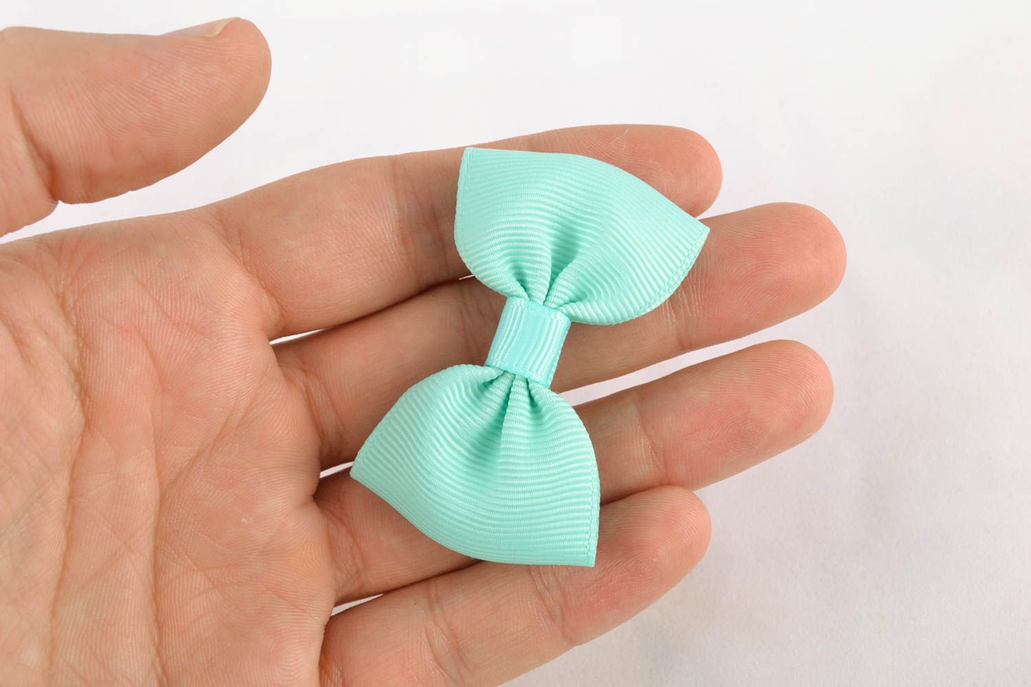 Hair clip with rep ribbon bow of turquoise color photo 2