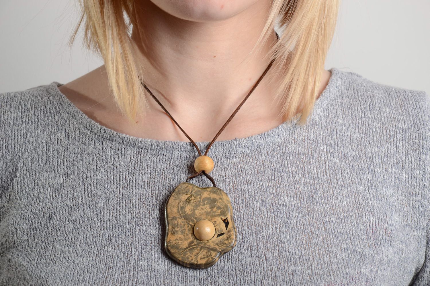 Handmade wooden carved tinted neck pendant of irregular shape for women photo 2