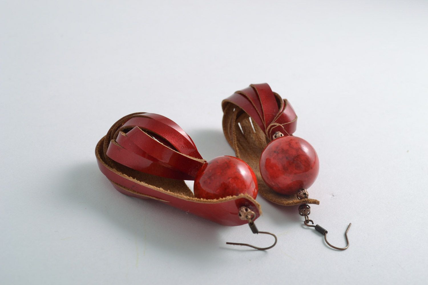 Handmade long earrings made of genuine leather with natural coral stone photo 4
