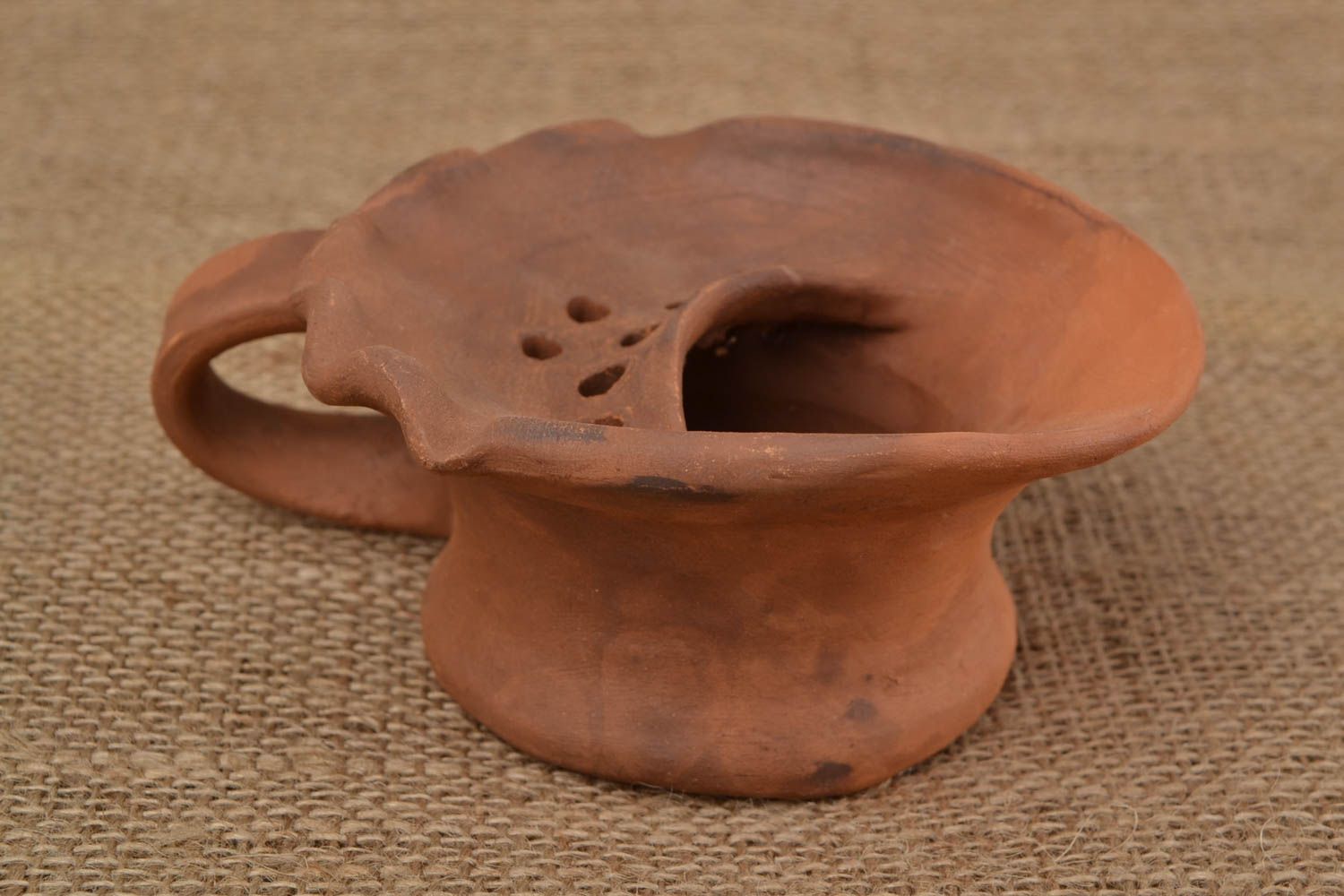 Handmade unusual ash-tray made of clay using pottery technique with handle photo 1