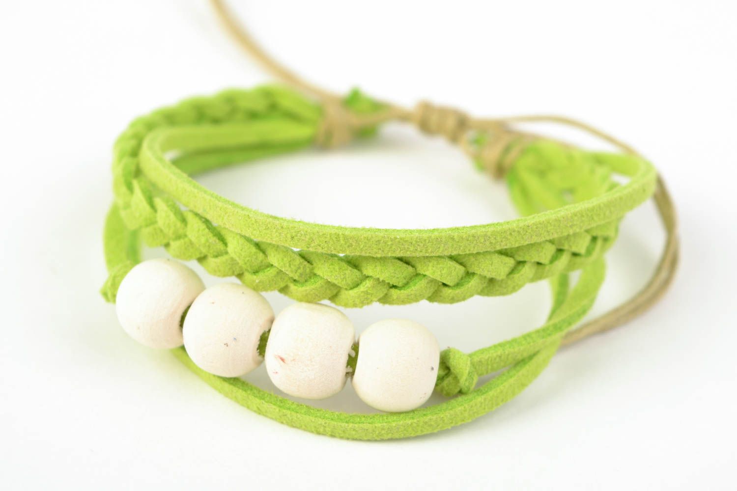 Handcrafted palegreen bracelet made of cotton threads interwined with wooden handmade beads photo 3