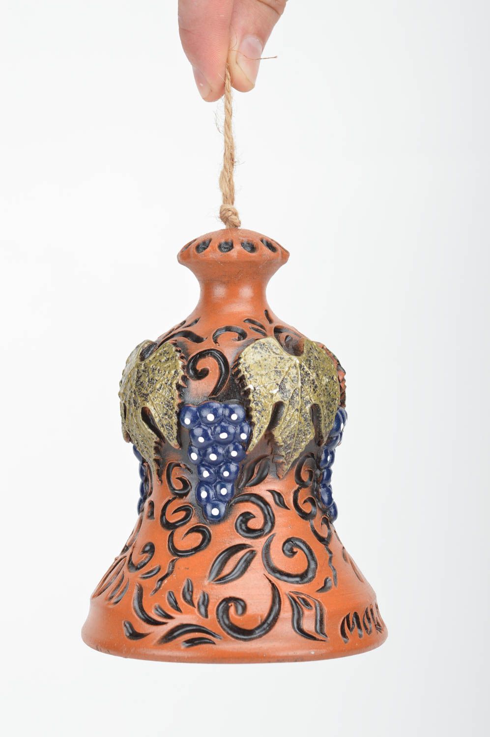 Handmade decorative beautiful small ceramic bell decorated with stucco photo 3