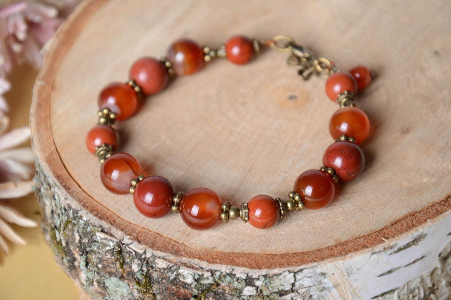 Pale red natural stones beaded adjustable bracelet with bronze charms for girls photo 1