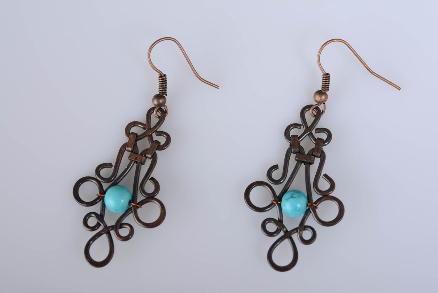 Massive earrings made of copper using wire wrap technique with artificial turquoise photo 3