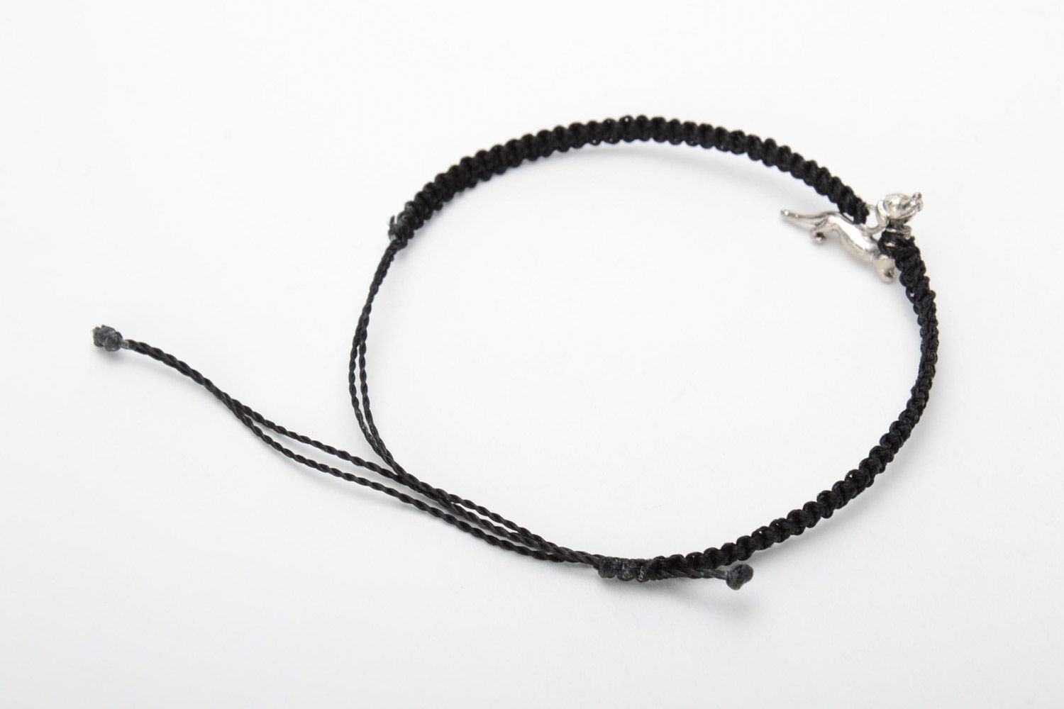 Handmade friendship bracelet woven of gray threads with a badger-dog charm photo 4