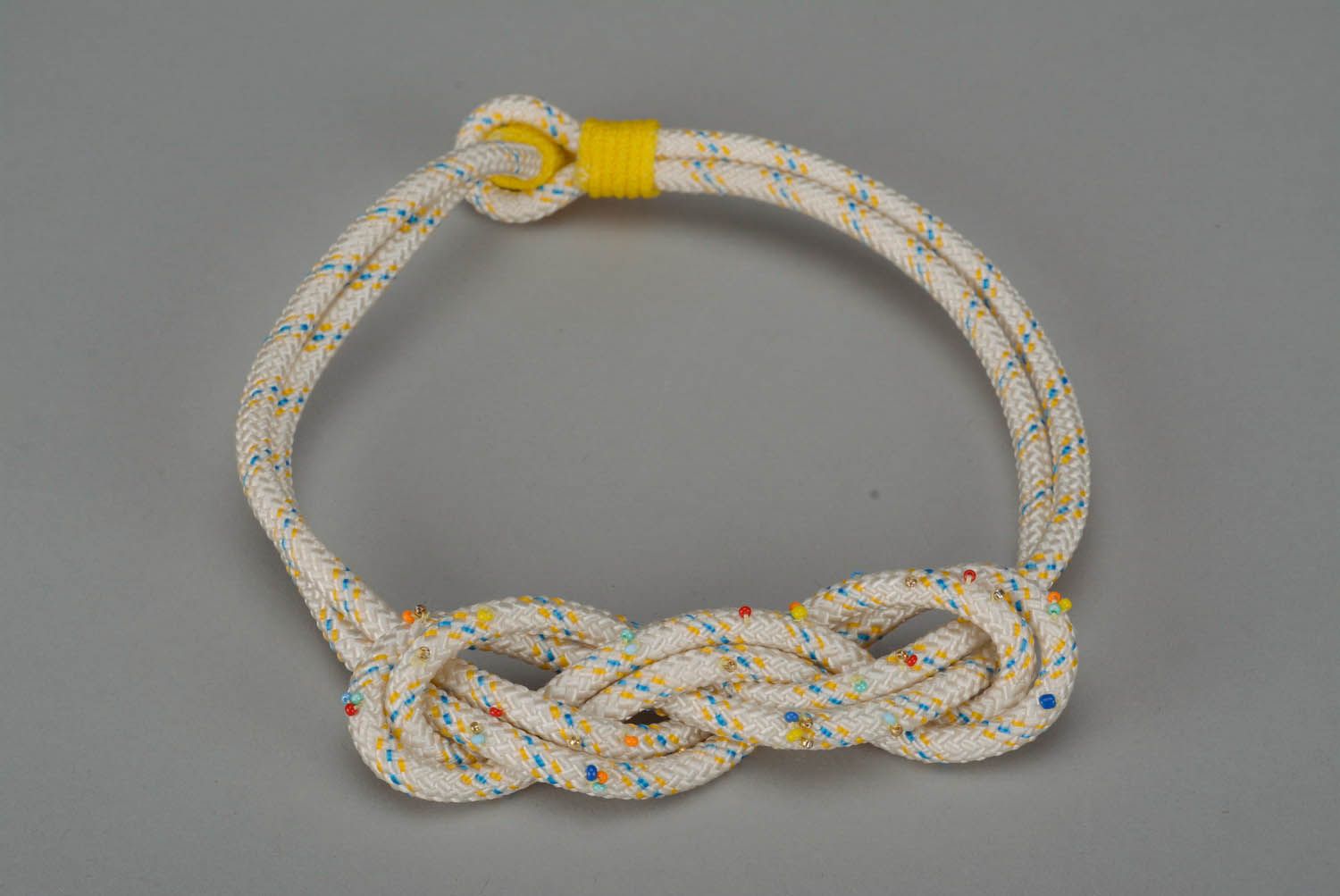 Necklace Made of String Embroidered with Beads photo 1