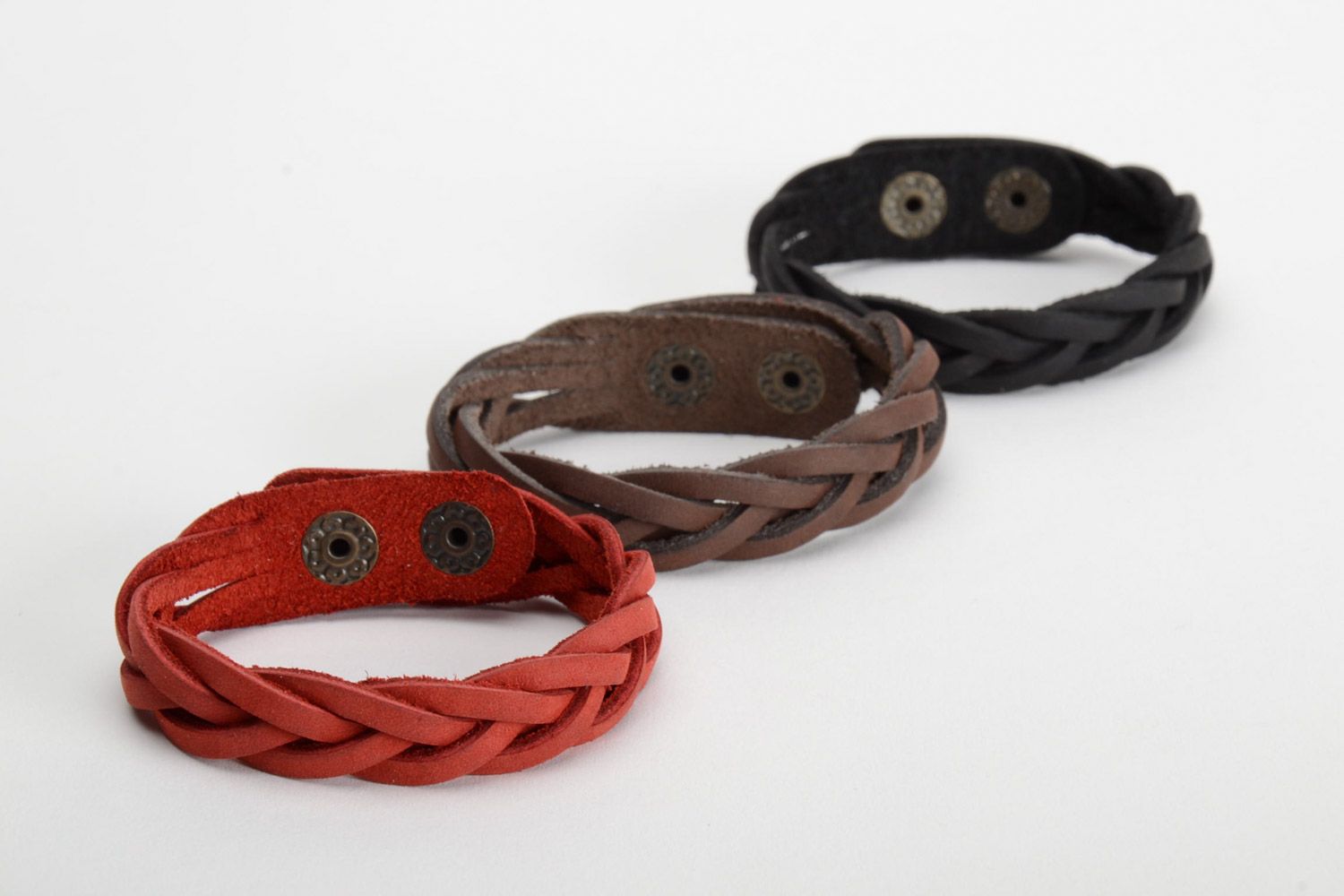 Set of three handmade wrist bracelets woven of red black and brown leather  photo 2