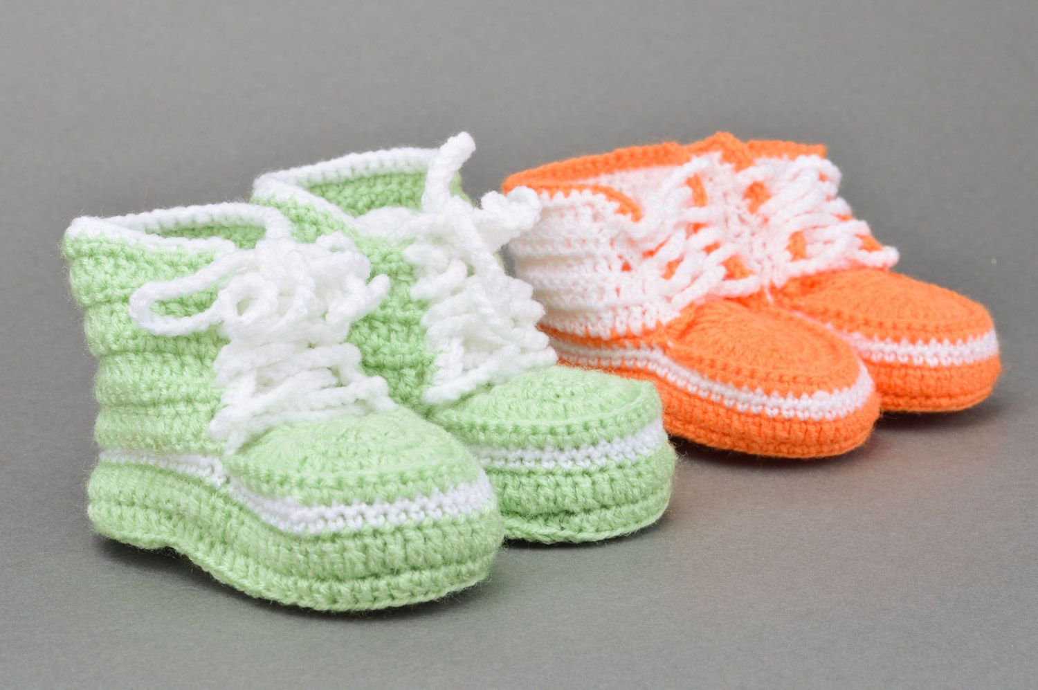 A set of handmade crocheted baby booties two pairs of light green and orange colors photo 4