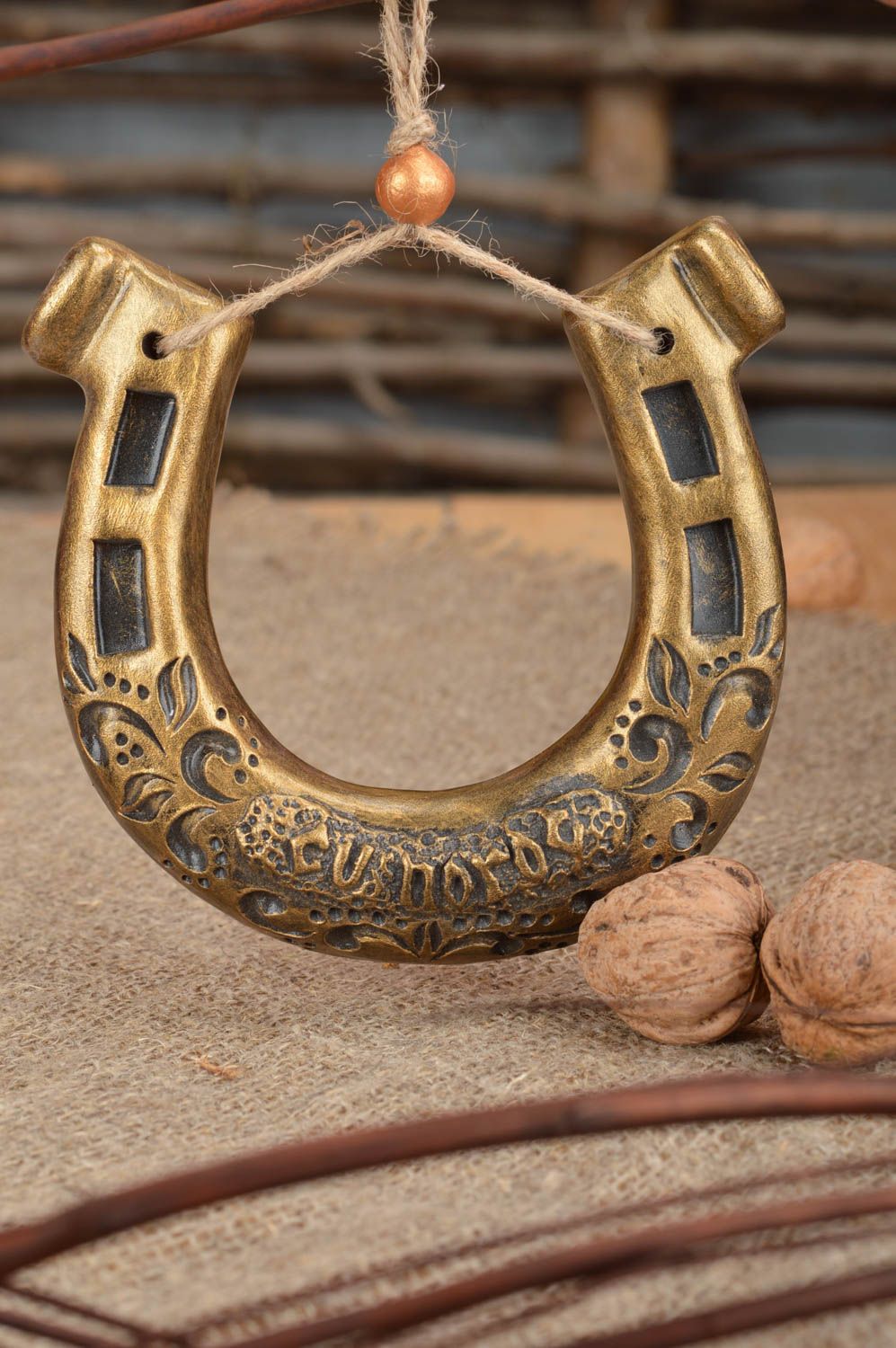 Beautiful homemade clay wall hanging horseshoe of gold color for good luck photo 1
