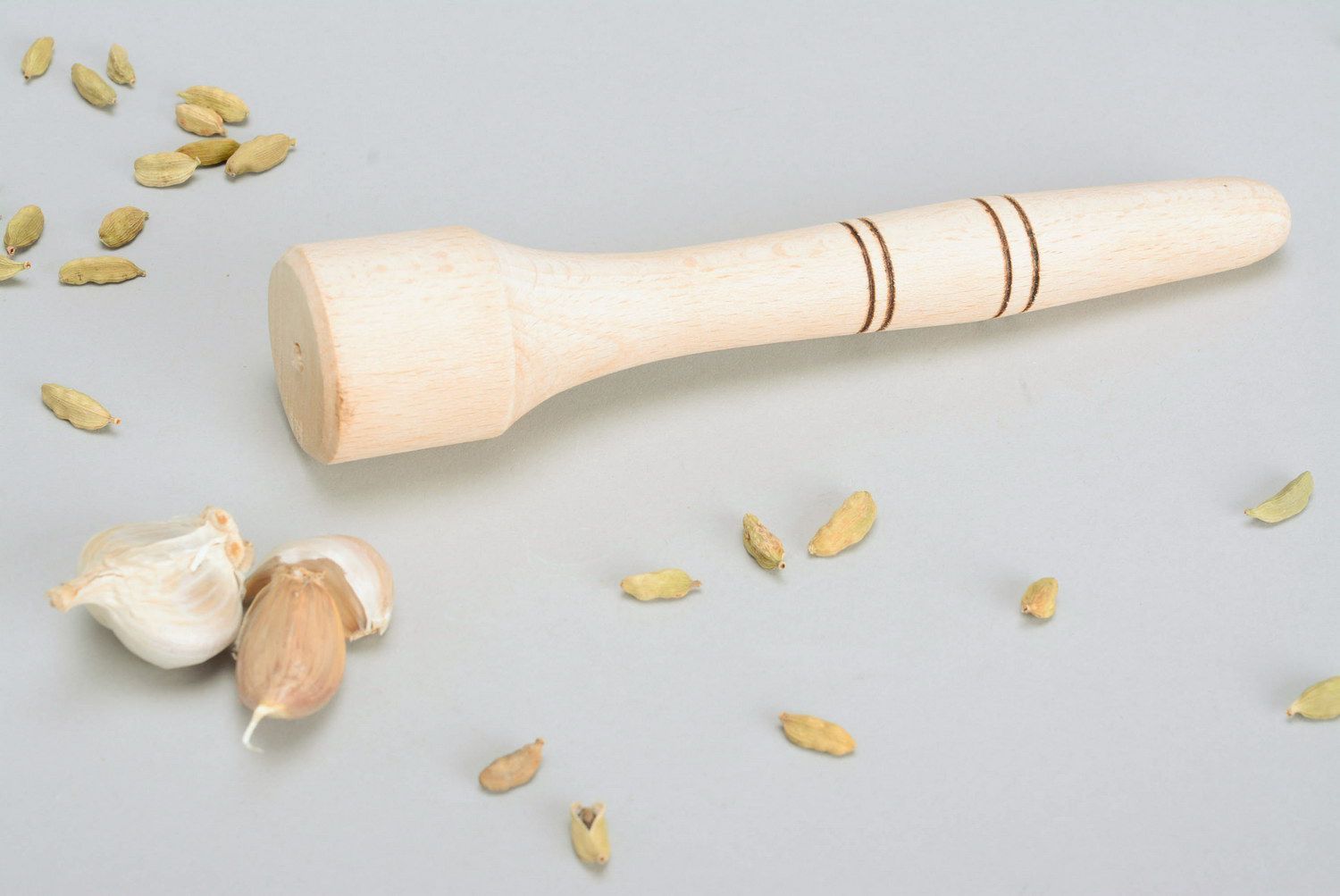 Wooden pestle without covering photo 1