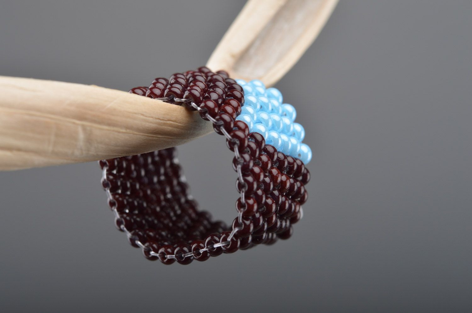 Laconic broad handmade ring woven of brads of brown and blue colors for women photo 3