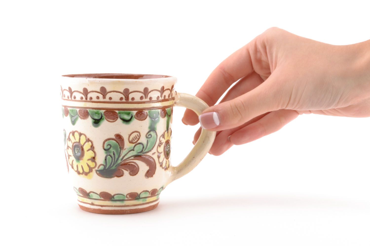Decorative clay glazed cup in beige, cherry, and green colors with handle photo 2
