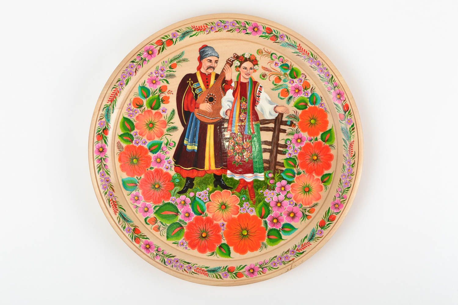 Красивая деревянная тарелка с Петриковской росписью ручной работы круглая фото 2
