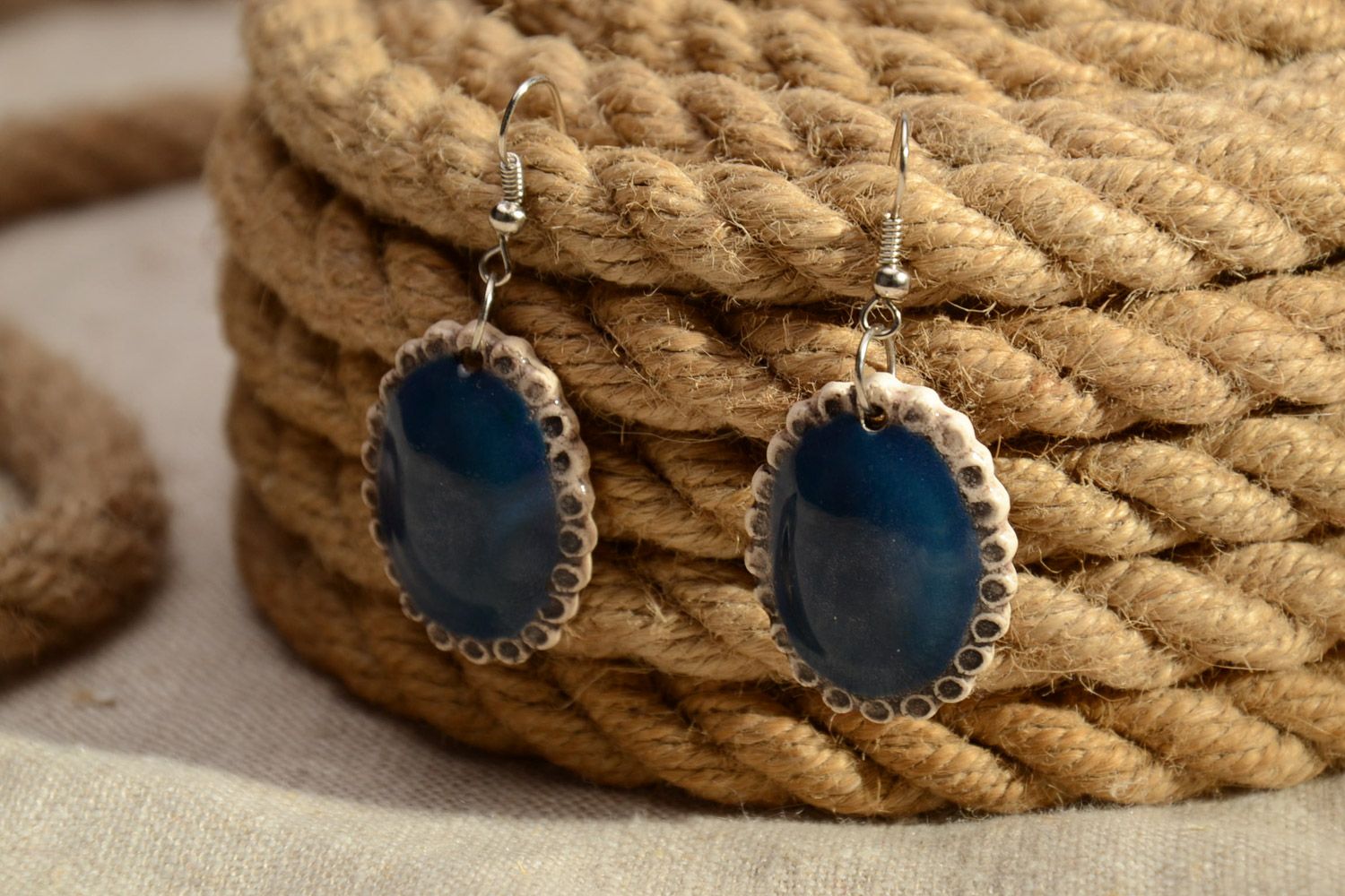 Handmade oval ceramic dangle earrings coated with blue enamel for women photo 1