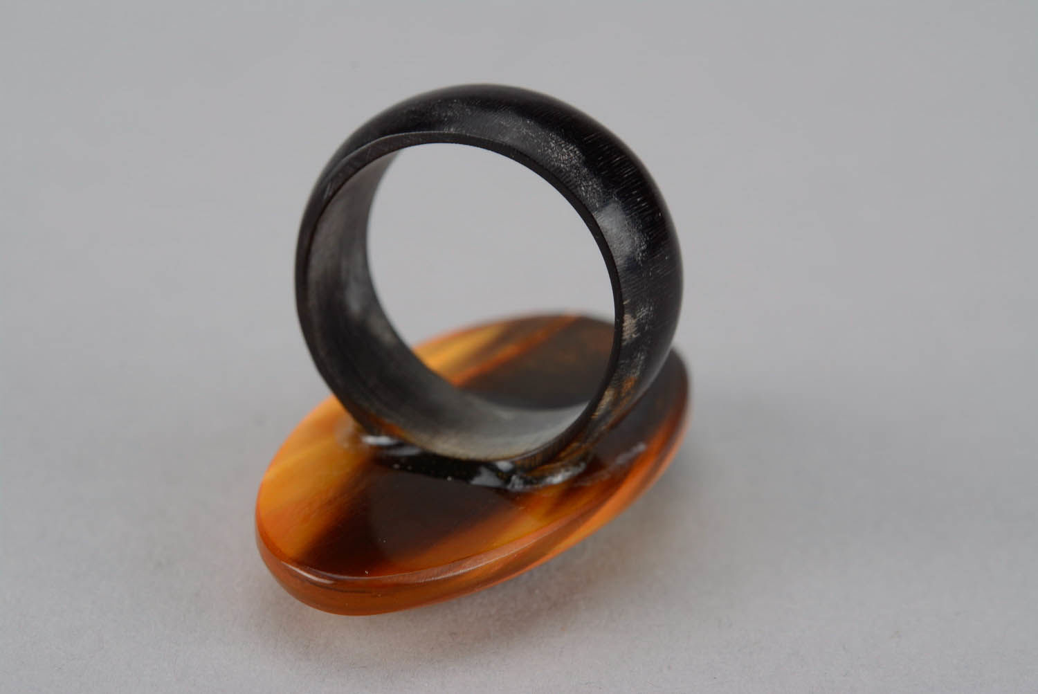 Ring made of cow horn Amber photo 1