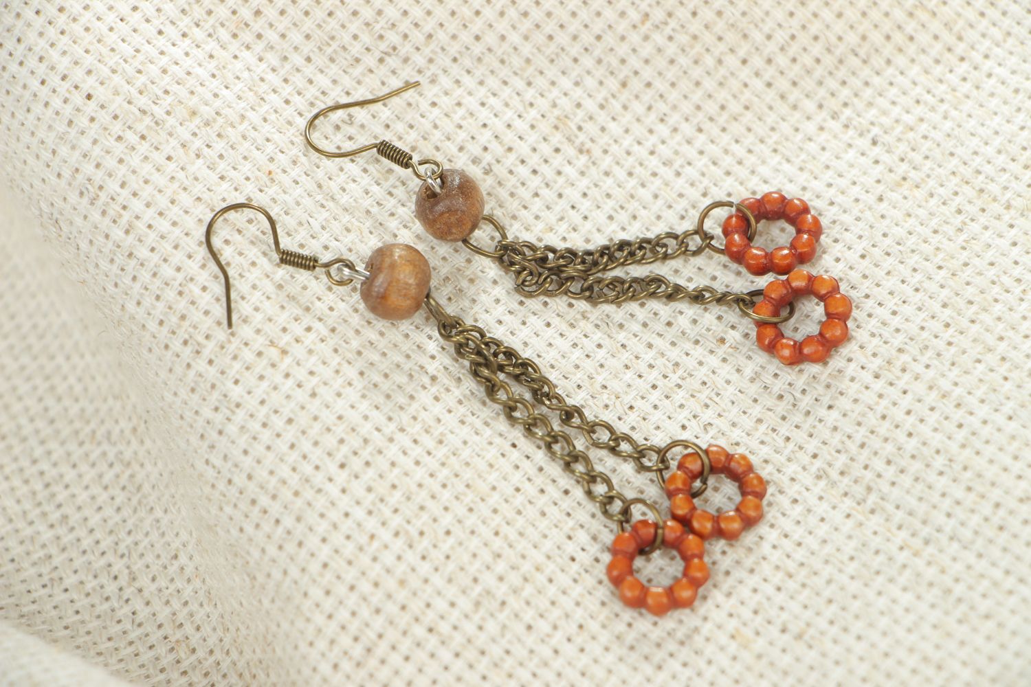 Handmade metal earrings with wooden beads photo 4