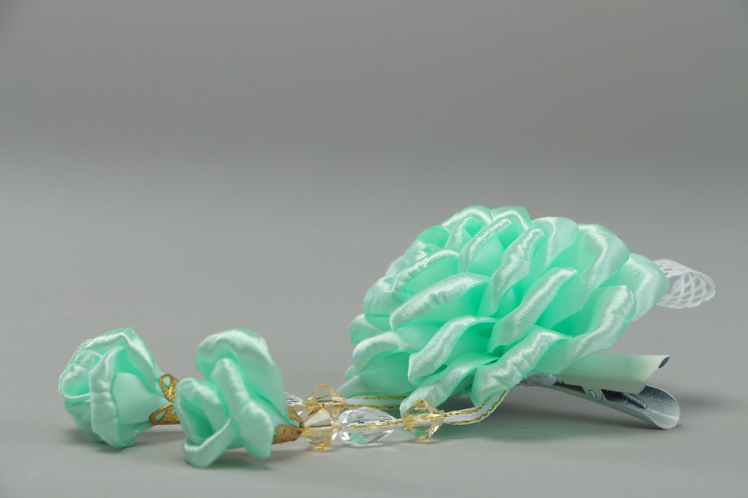 Handmade hair clip with flower made of satin ribbons of mint color and beads photo 2
