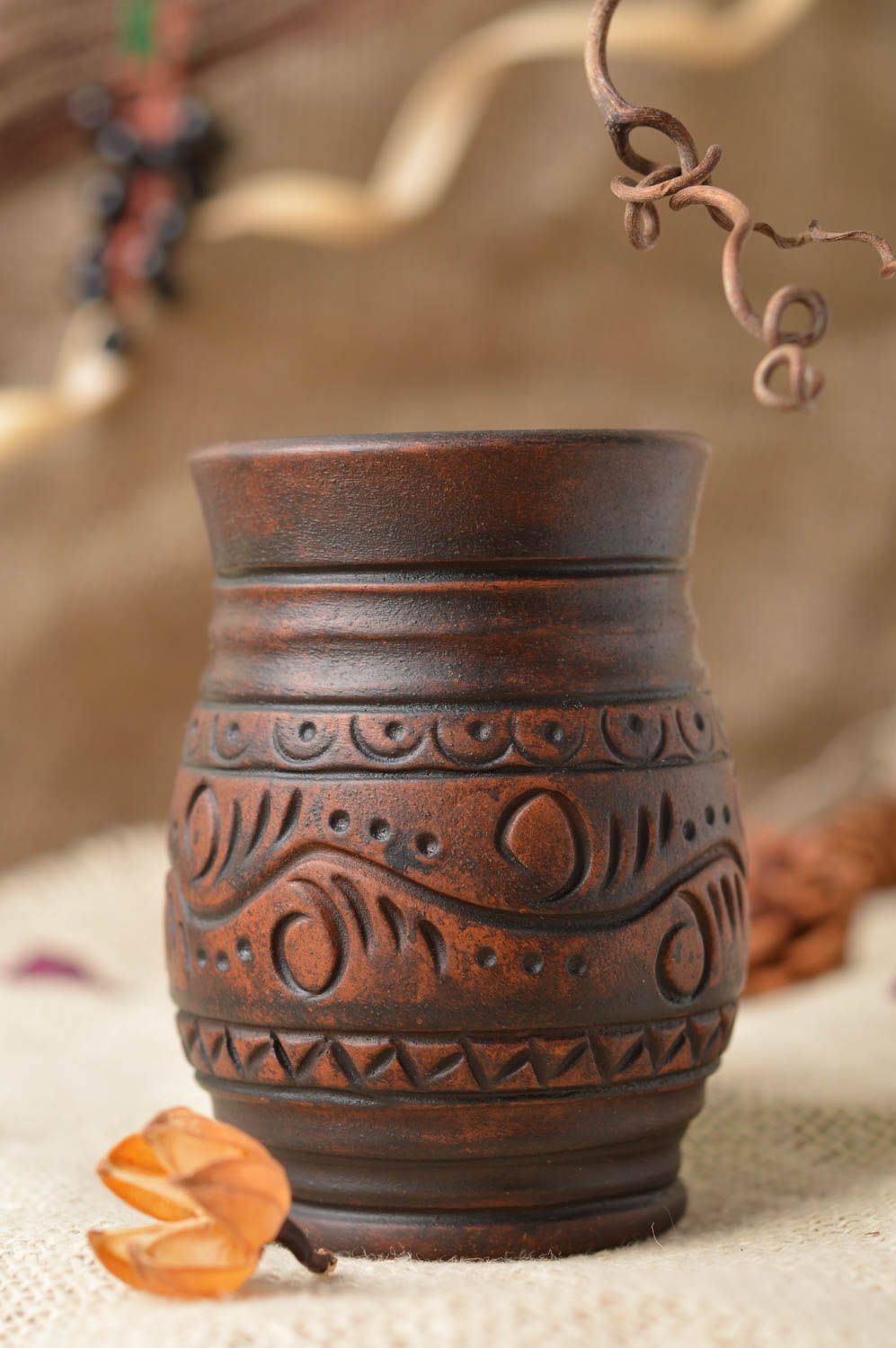 Handmade large brown ceramic glass red clay drinkware in ethnic style ornamented photo 1
