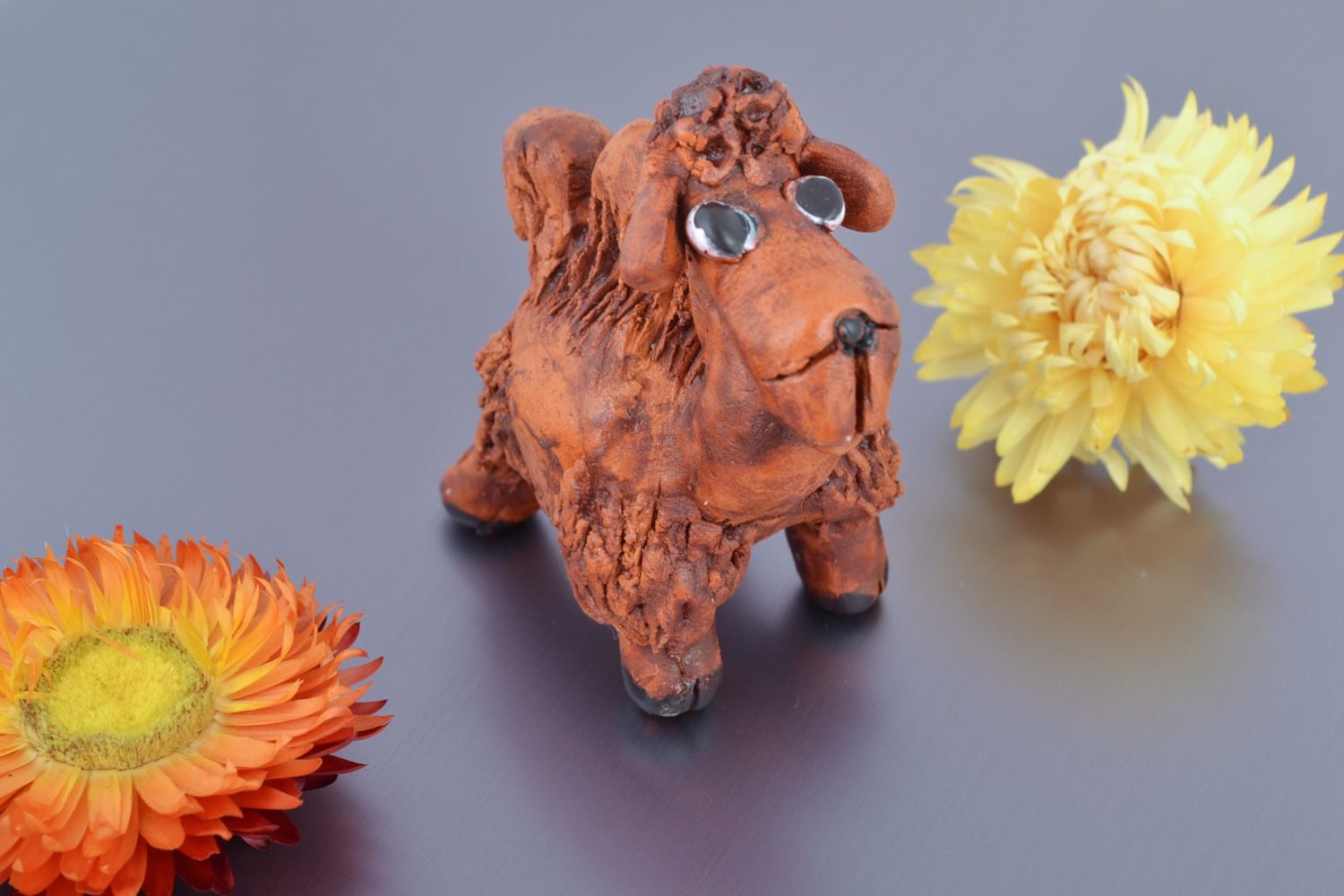 Handmade miniature funny painted ceramic figurine of camel for interior decor photo 1
