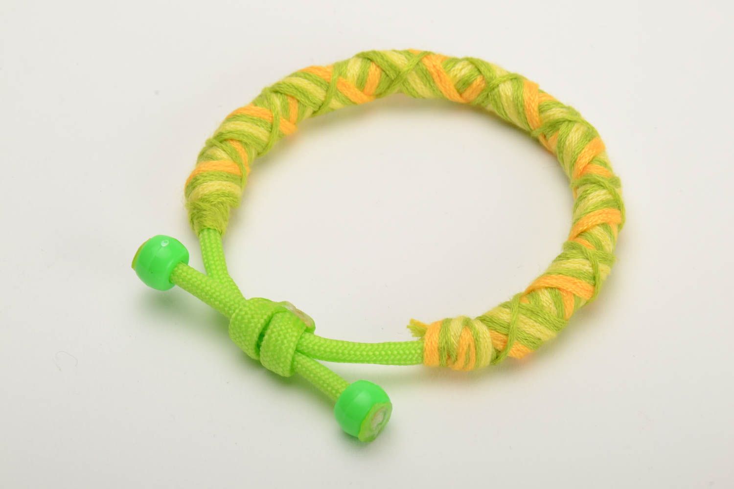 Handmade bracelet made of floss thread and parachute cord beautiful female designer accessory photo 2