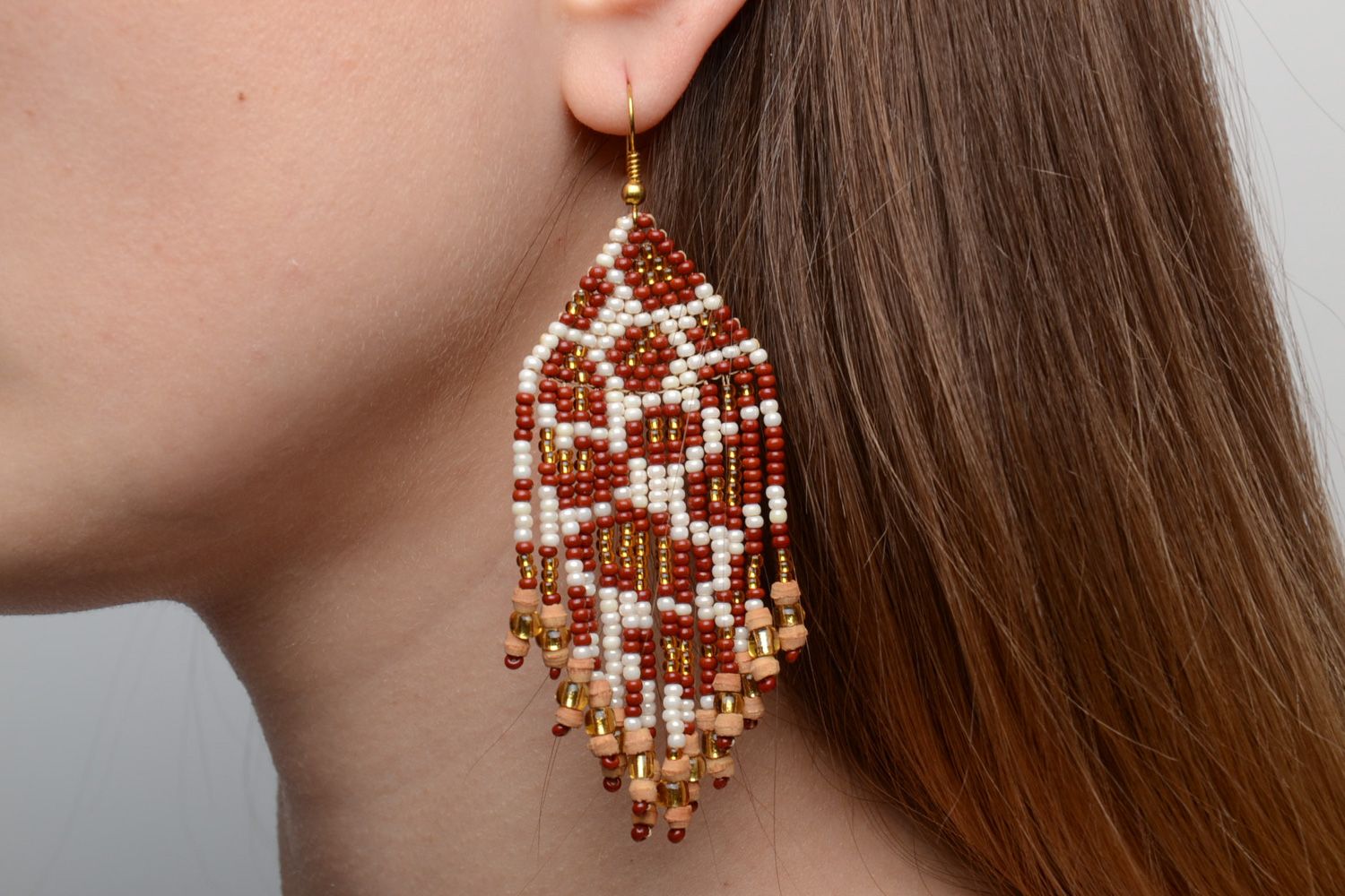 Handmade long dangle earrings woven of beads and thread of white and brown colors photo 2