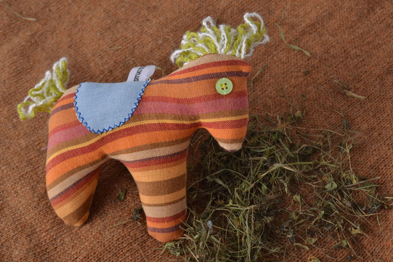 Мягкая игрушка из ткани ручной работы разноцветная для детей и интерьера Конь фото 1