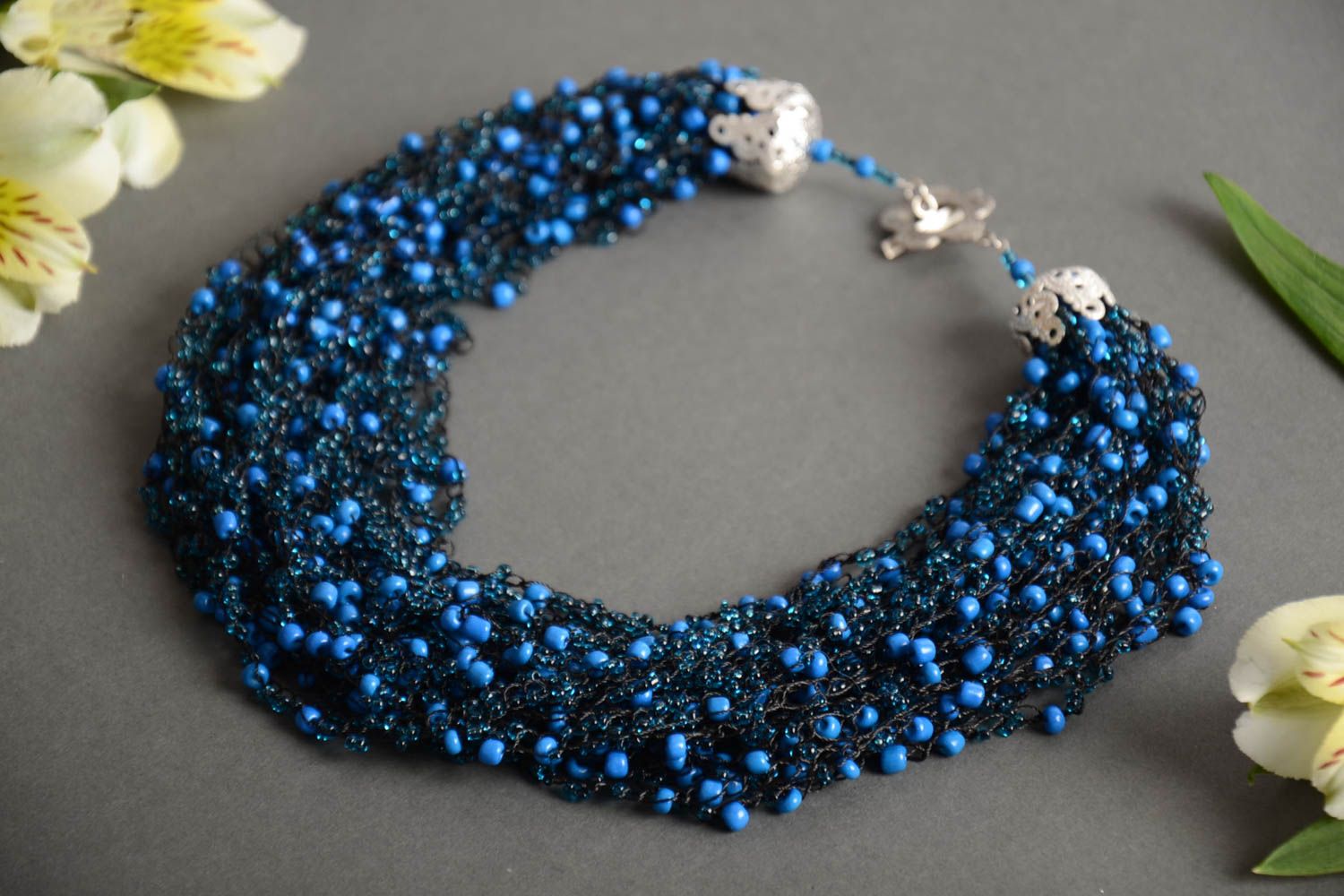 Handmade massive volume necklace crocheted of beads in dark blue color palette photo 1
