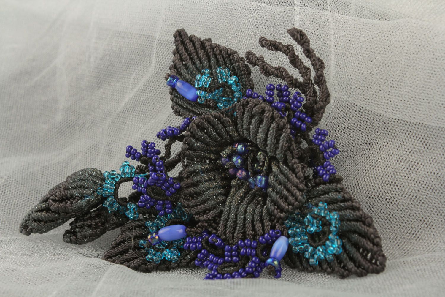 Black-blue woven brooch photo 1