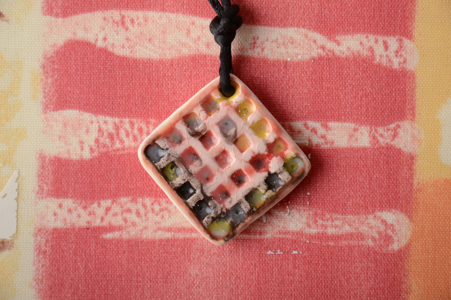 Ceramic pendant of rhombus shape with waxed cord photo 1