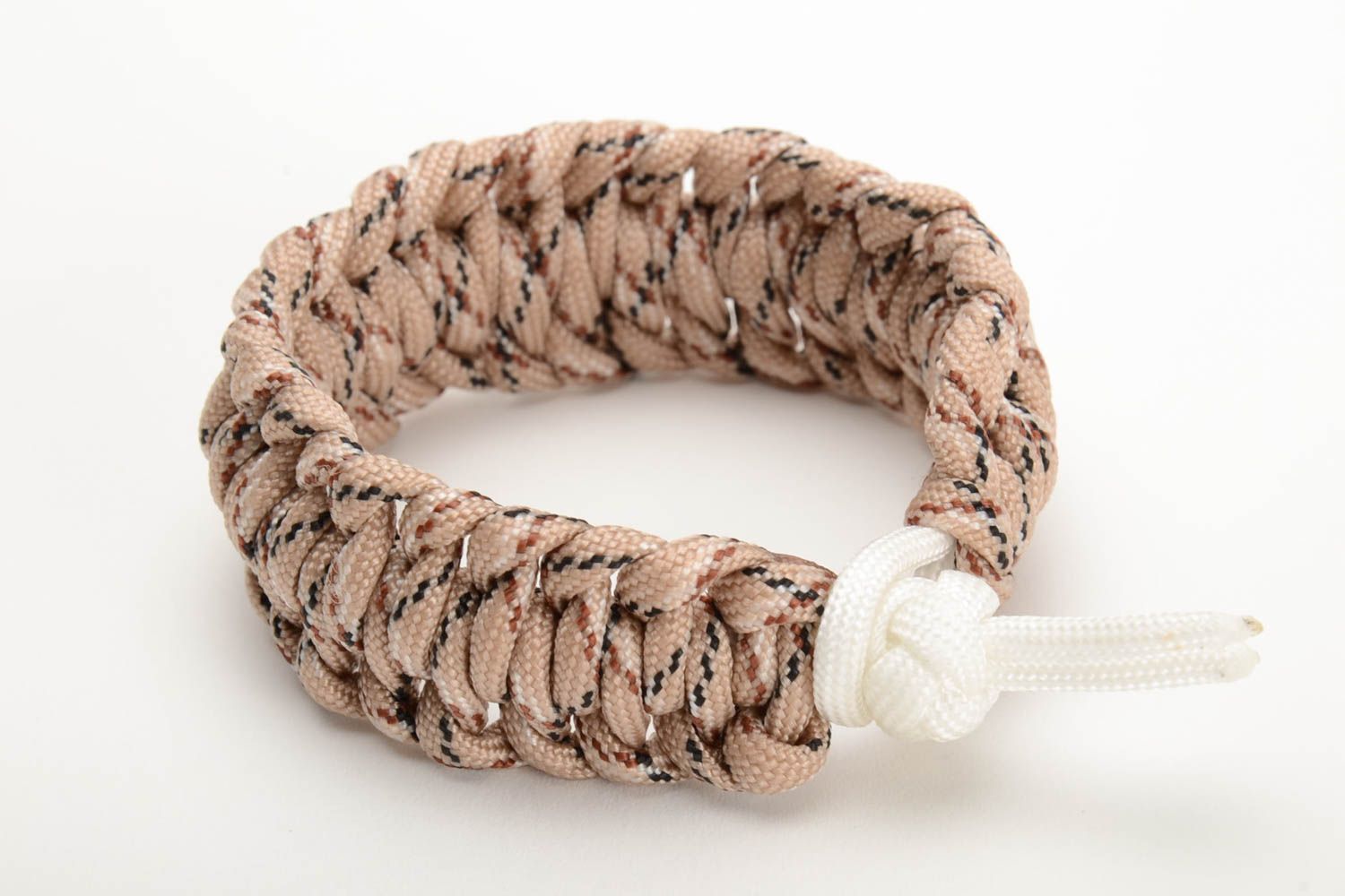 Handmade broad survival wrist bracelet woven of parachute cord of beige color  photo 4
