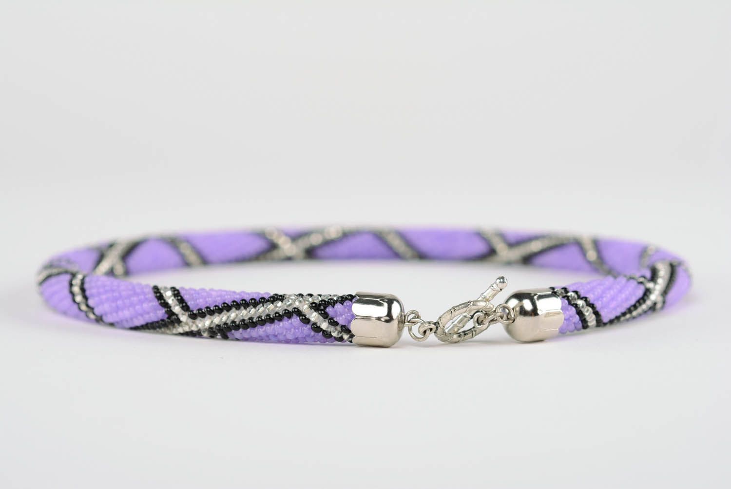 Purple beaded cord photo 1