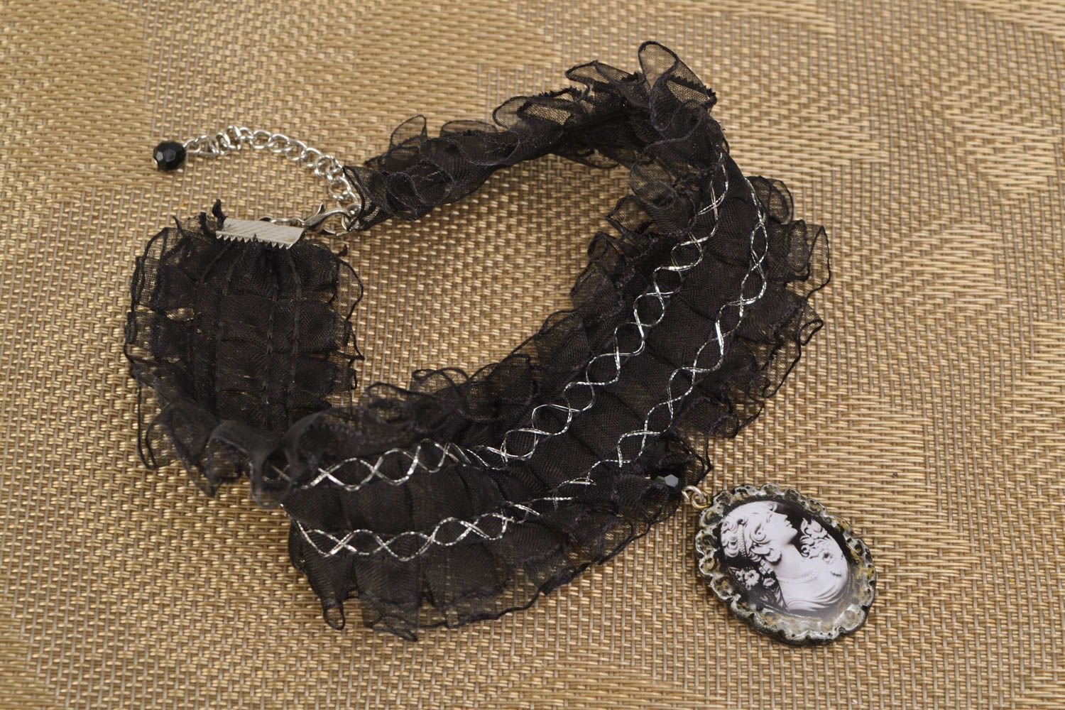 Black textile necklace with cameo photo 1