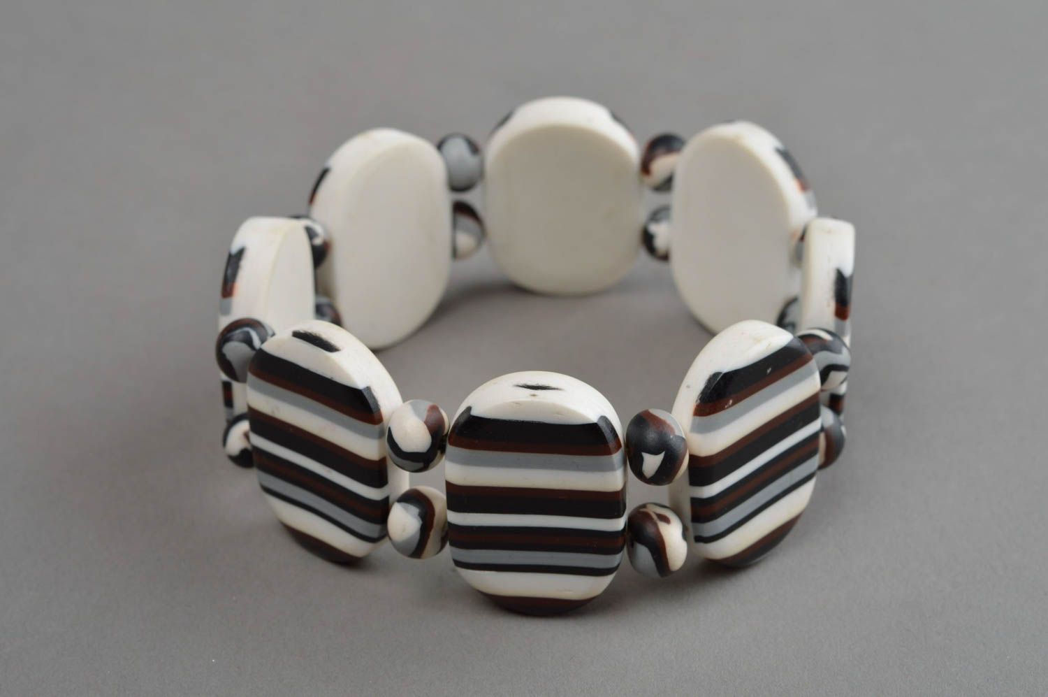 White, grey, brown colors' fashion bracelet on elastic cord photo 3