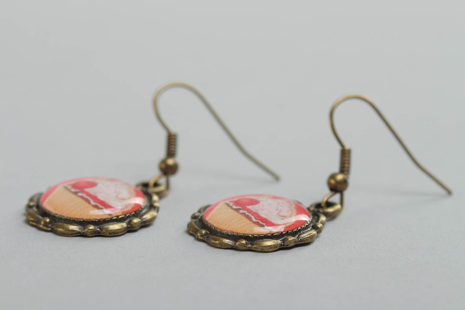 Handmade beautiful women's earrings made of glass glaze with a print Cakes photo 3