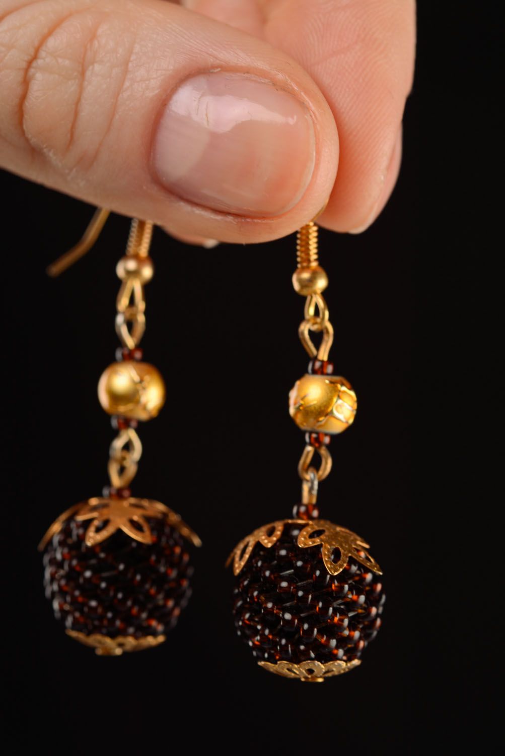 Boucles d'oreilles artisanales en perles de rocaille photo 2
