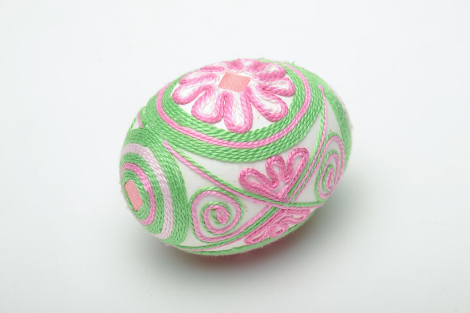 Decorative Easter egg ornamented with threads photo 4