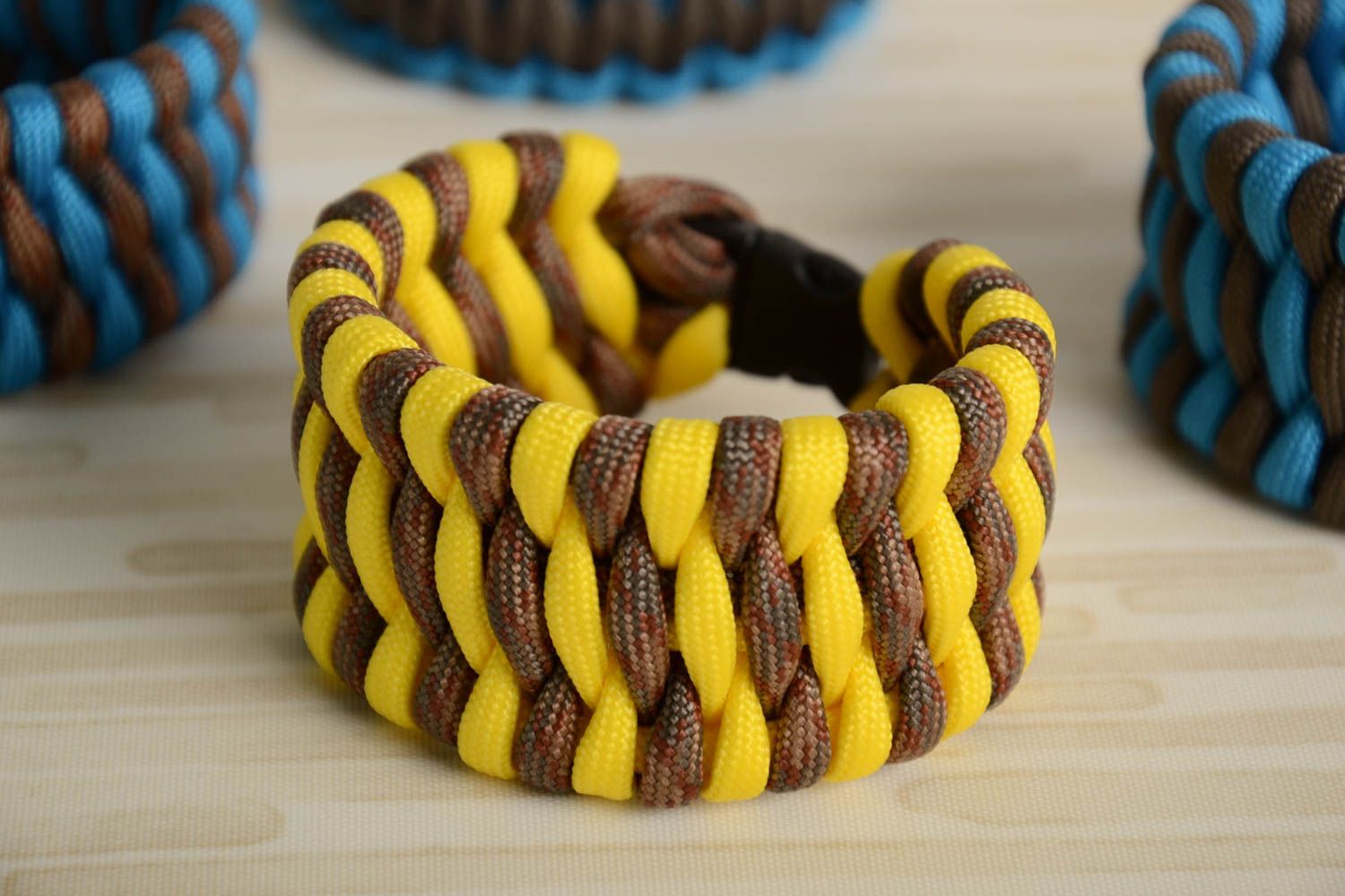 Yellow handmade survival bracelet woven of American paracord photo 1
