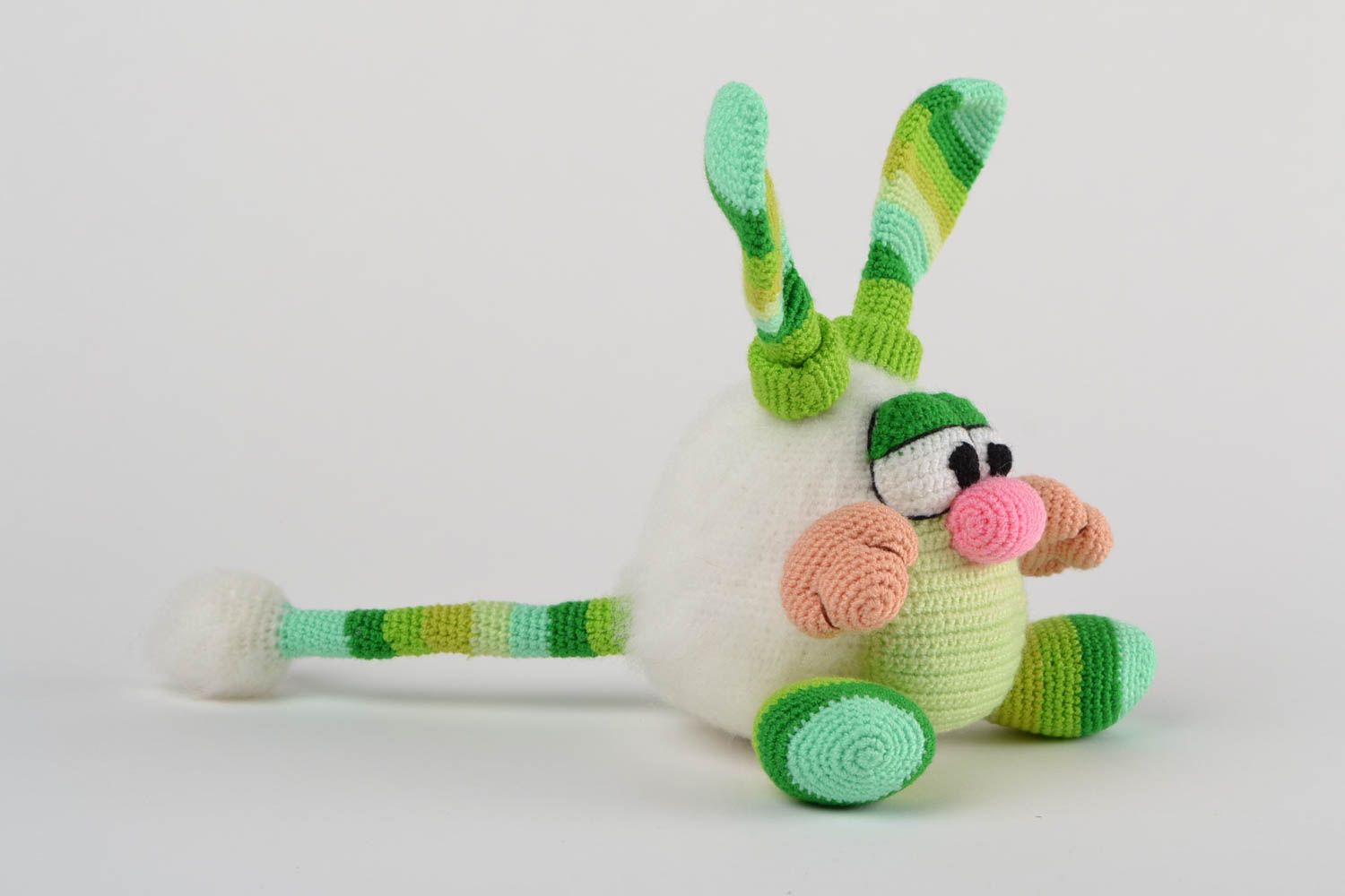 Handmade designer soft toy crocheted of acrylic threads green striped rabbit photo 4