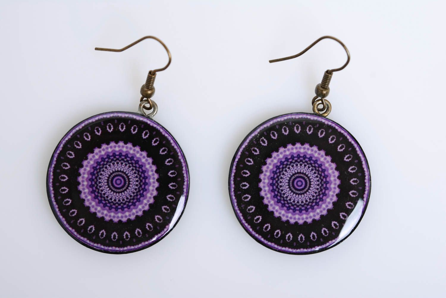 Polymer clay earrings with pattern round-shaped black with purple hand made photo 1