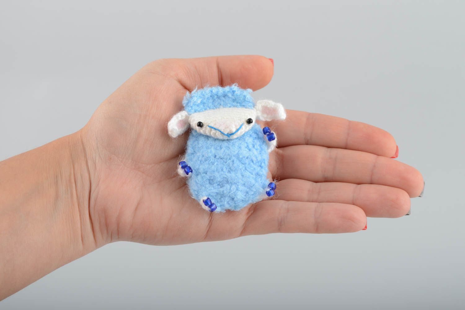 Soft crocheted toy magnet in the form of lamb small blue handmade accessory photo 4