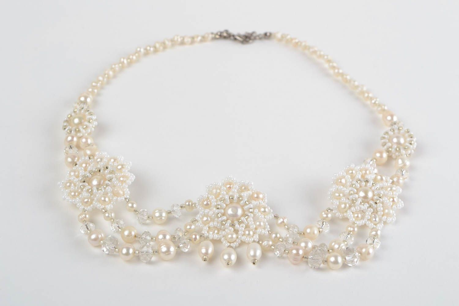 Beautiful festive handmade white necklace made of beads and natural stones photo 5