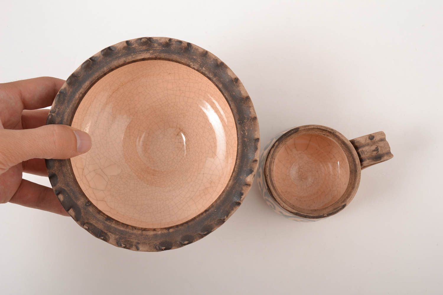 Decorative set of clay handmade pottery of the bowl and cup with rustic style pattern photo 2