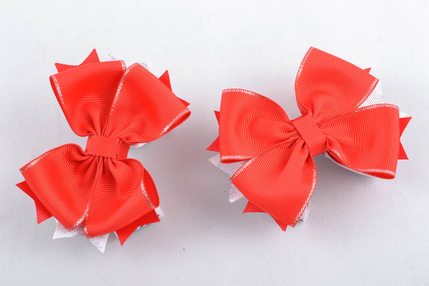 Beautiful bows made of silk corded ribbons photo 1