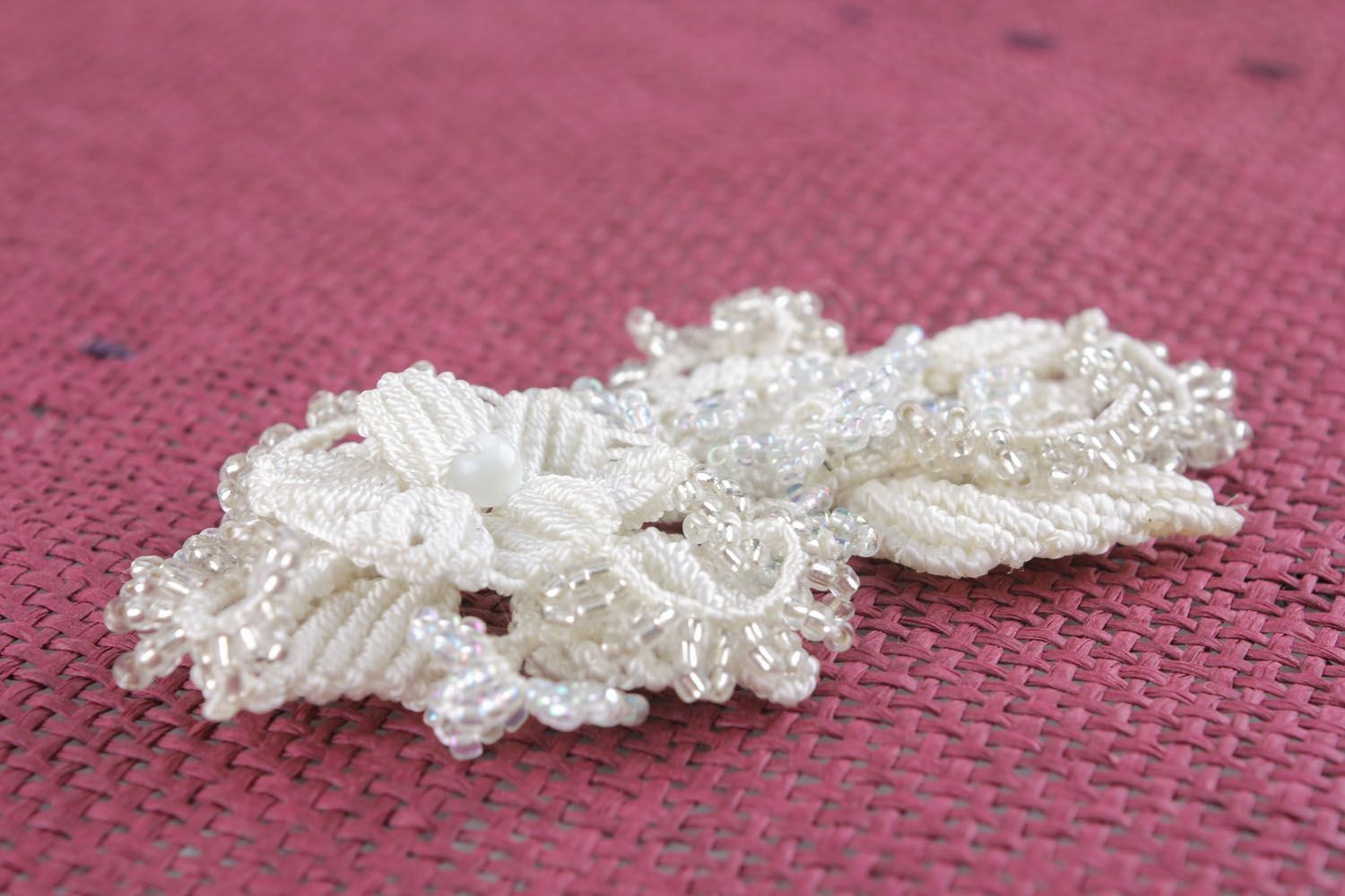 White brooch woven of beads and threads photo 2
