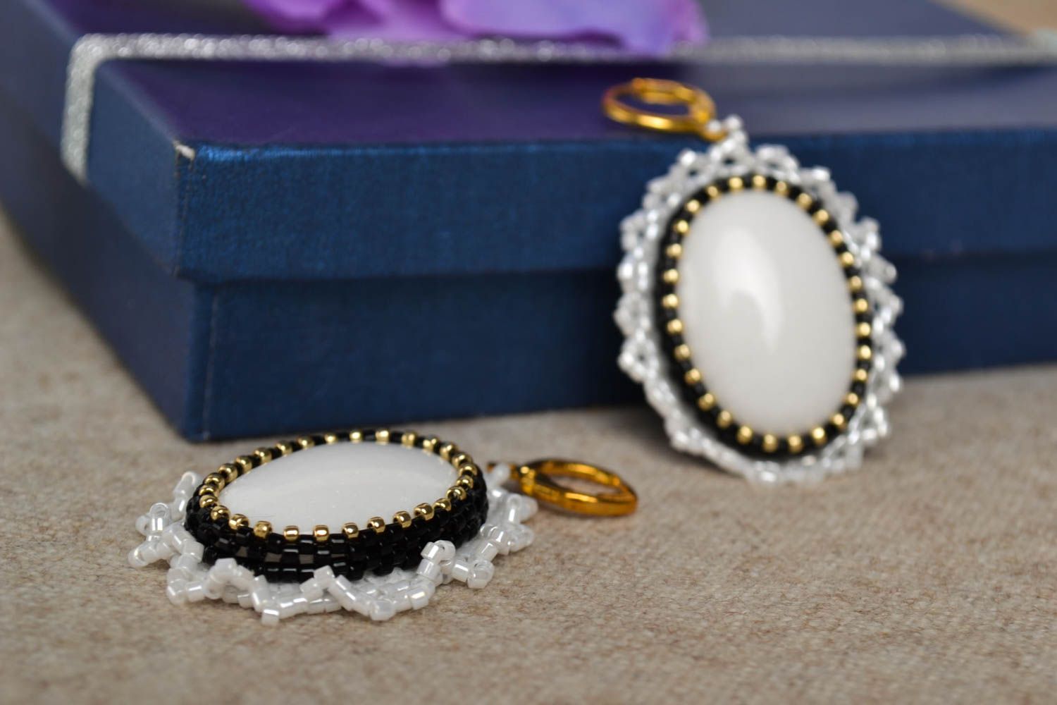 Handmade white beaded earrings festive openwork earrings designer jewelry photo 1